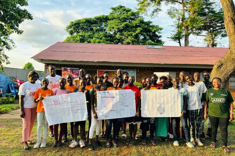 Group photo with children and support team after the dialogue credit : World Vision