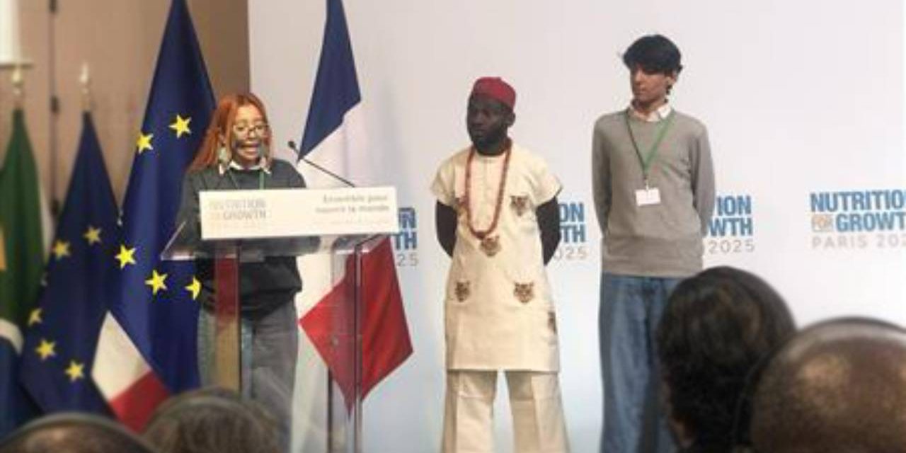 a picture of the children reading the statement at the Summit