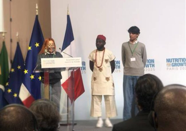 a picture of the children reading the statement at the Summit
